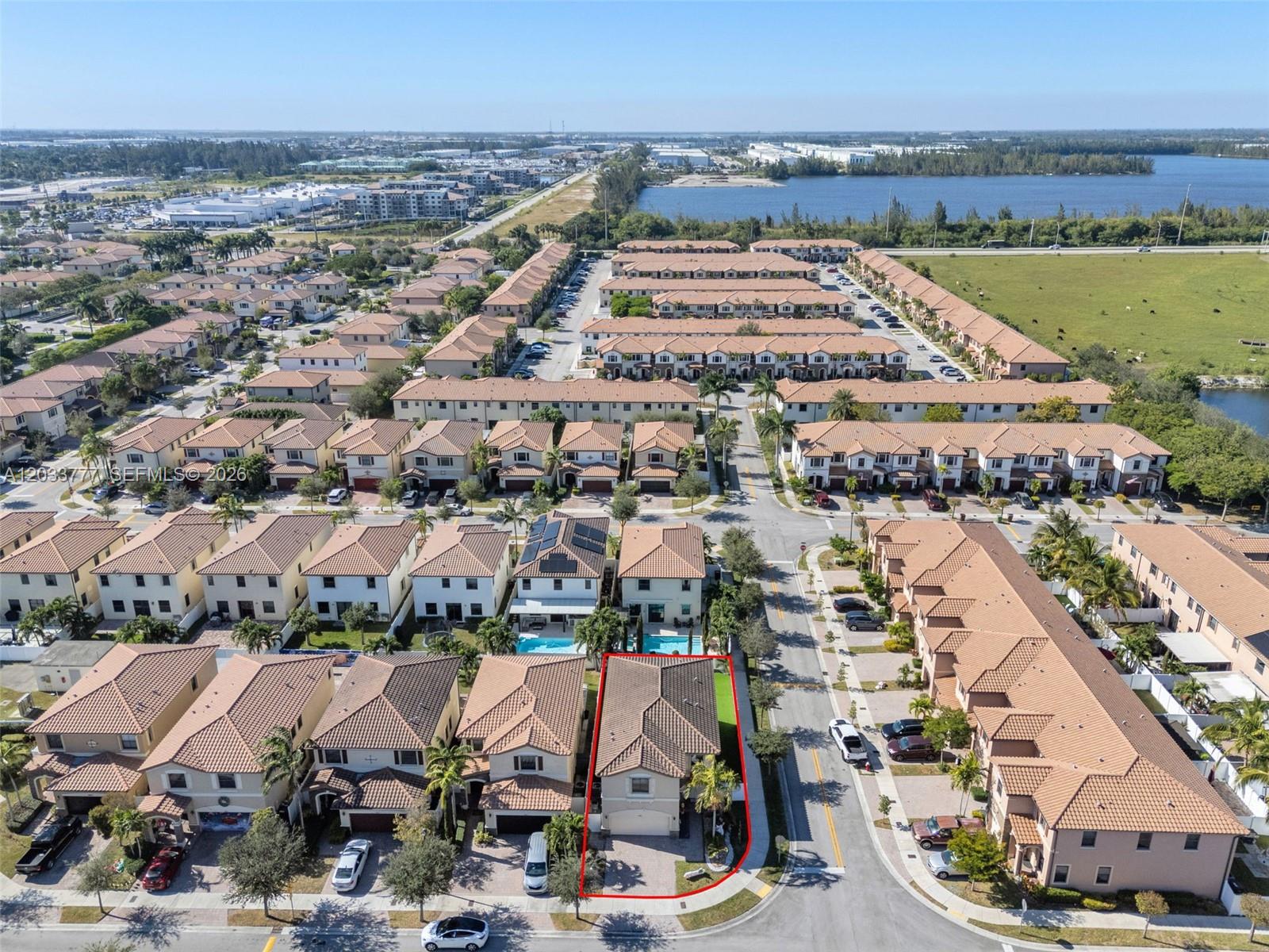 An aerial view shows a residential neighborhood with a highlighted single-family home on a corner lot — 8894 W 34th Ave, Hialeah FL 33018, HIALEAH, FL