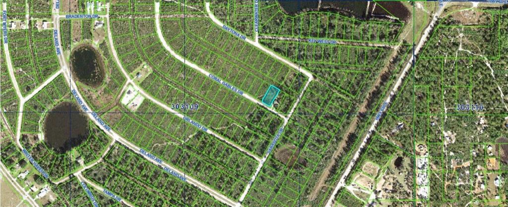 This is an aerial map view of a vacant residential lot highlighted in blue — CORAL GABLES DRIVE, INDIAN LAKE ESTATES, FL