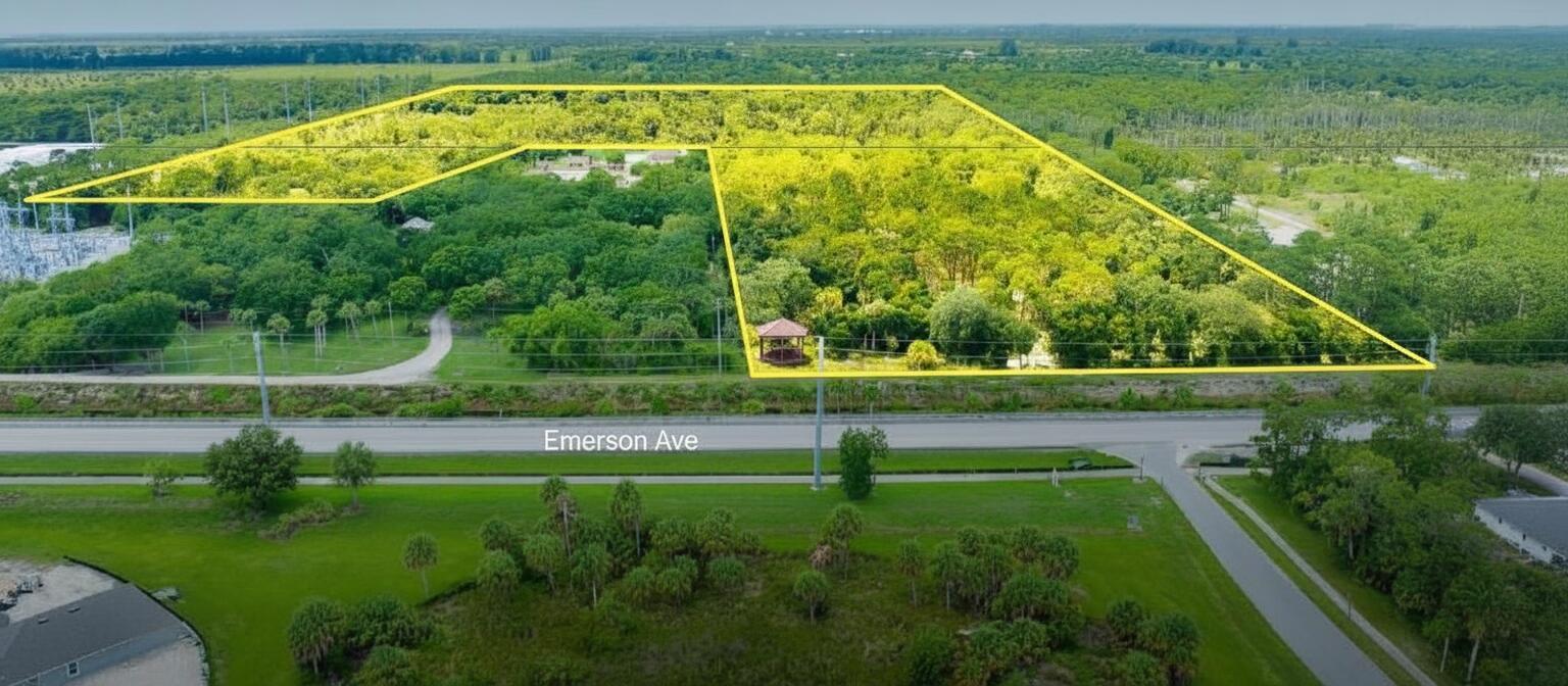 An aerial view shows a large, wooded parcel of land outlined in yellow along Emerson Ave — 5562 Russakis Road, Fort Pierce FL 34951, FORT PIERCE, FL