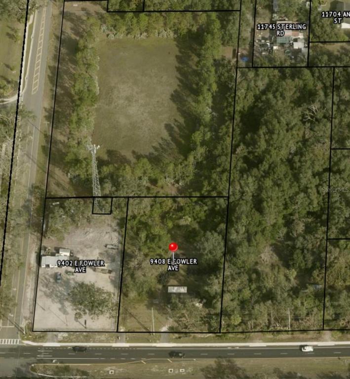 9410 E FOWLER AVENUE, THONOTOSASSA, FL — photo 4 of 6