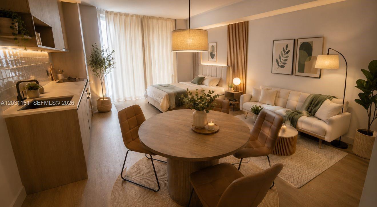 This studio apartment features a kitchen, dining area, and bedroom with modern neutral decor — 90 NE 32nd St # 624, Miami FL 33137, MIAMI, FL