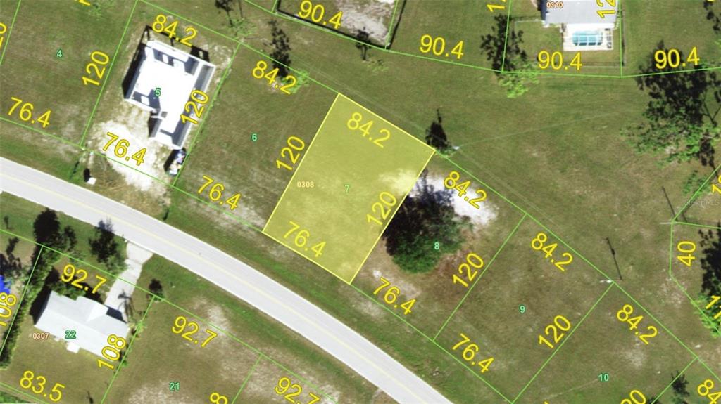 This is an aerial map showing property lot lines and dimensions for a residential area — 25142 ALCAZAR DRIVE, PUNTA GORDA, FL