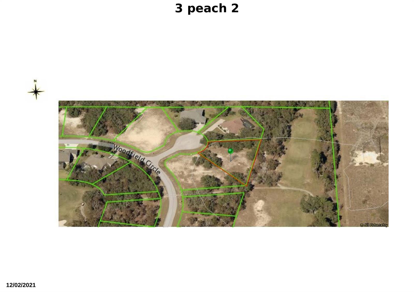 This is an aerial map showing a vacant residential lot outlined in red on Woodfield Circle — 3 Peachwood Point, FL 34446, FL