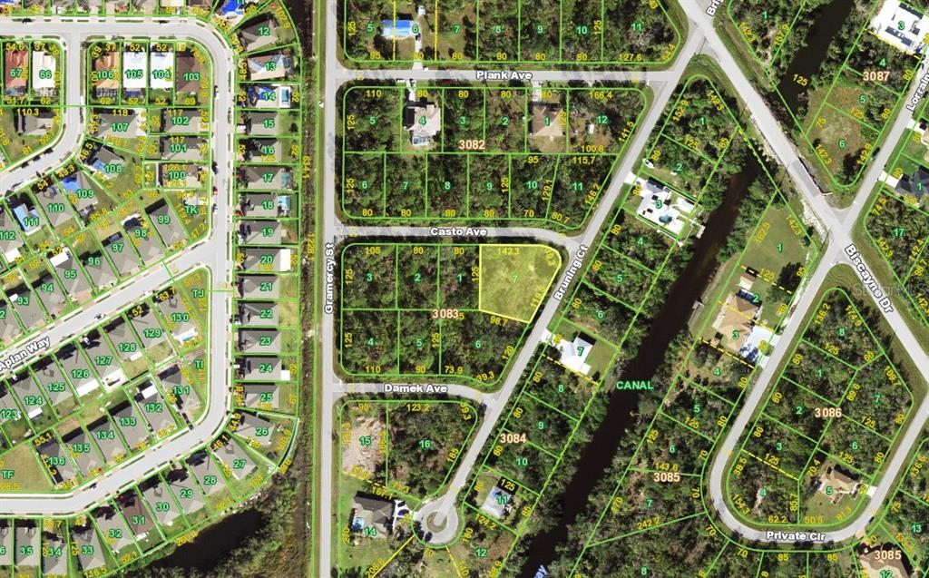 This is an aerial map showing residential lots, streets, and a canal — 15309 CASTO AVENUE, PORT CHARLOTTE, FL