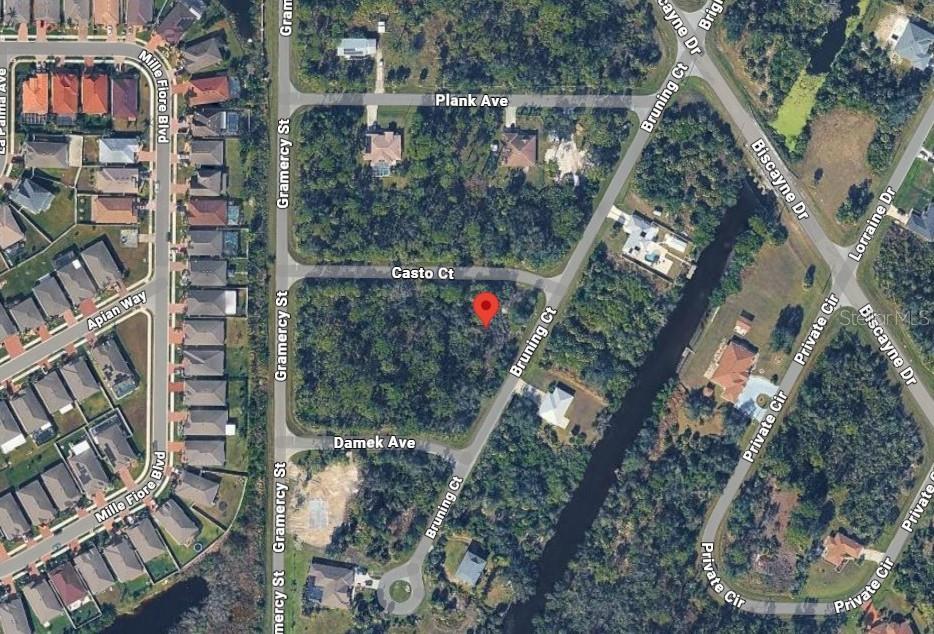 This is an aerial map view of a vacant, wooded residential lot — 15309 CASTO AVENUE, PORT CHARLOTTE, FL