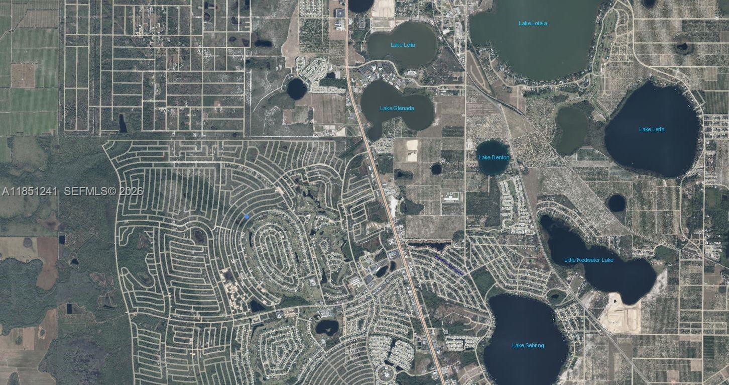 A low-slung building with a metal roof serves as the Sun 'n Lake district office — 6579 San Bruno Dr, Sebring FL 33872, SEBRING, FL