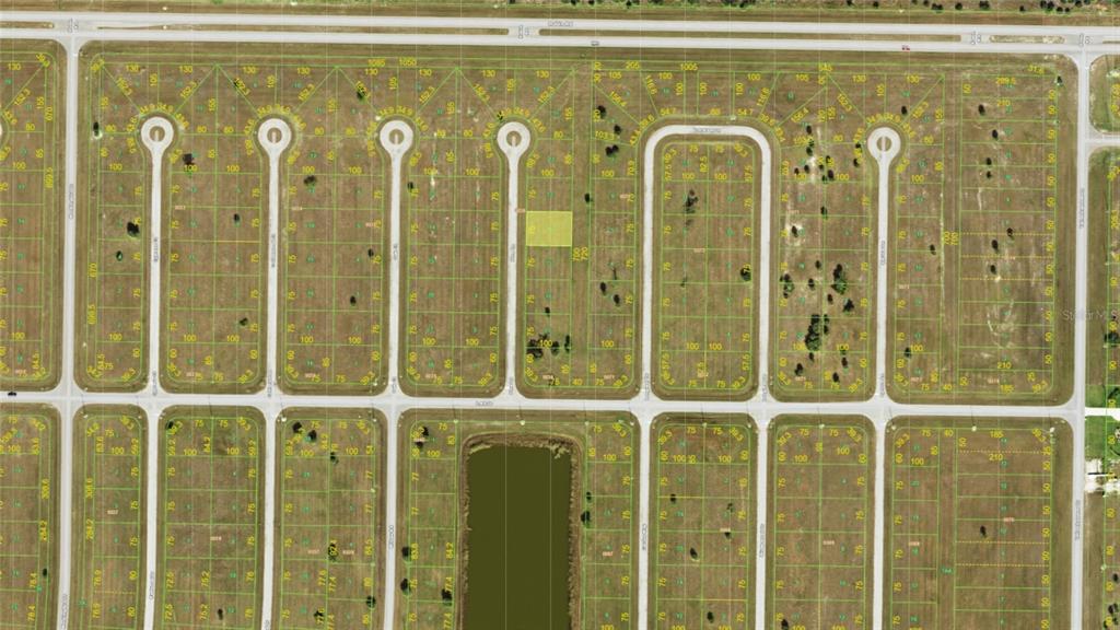 This is an aerial map showing a residential subdivision with multiple vacant lots and streets — 10 PINE LANE, PLACIDA, FL