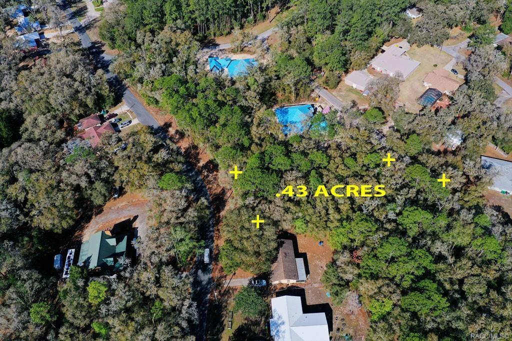 This aerial view shows a wooded residential lot marked as .43 acres — 2663 W CYPRESS DRIVE, DUNNELLON, FL