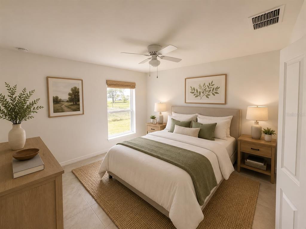 This bedroom features a queen bed, two nightstands, a dresser, and a window with blinds — 4104 NE 12TH COURT, CAPE CORAL, FL