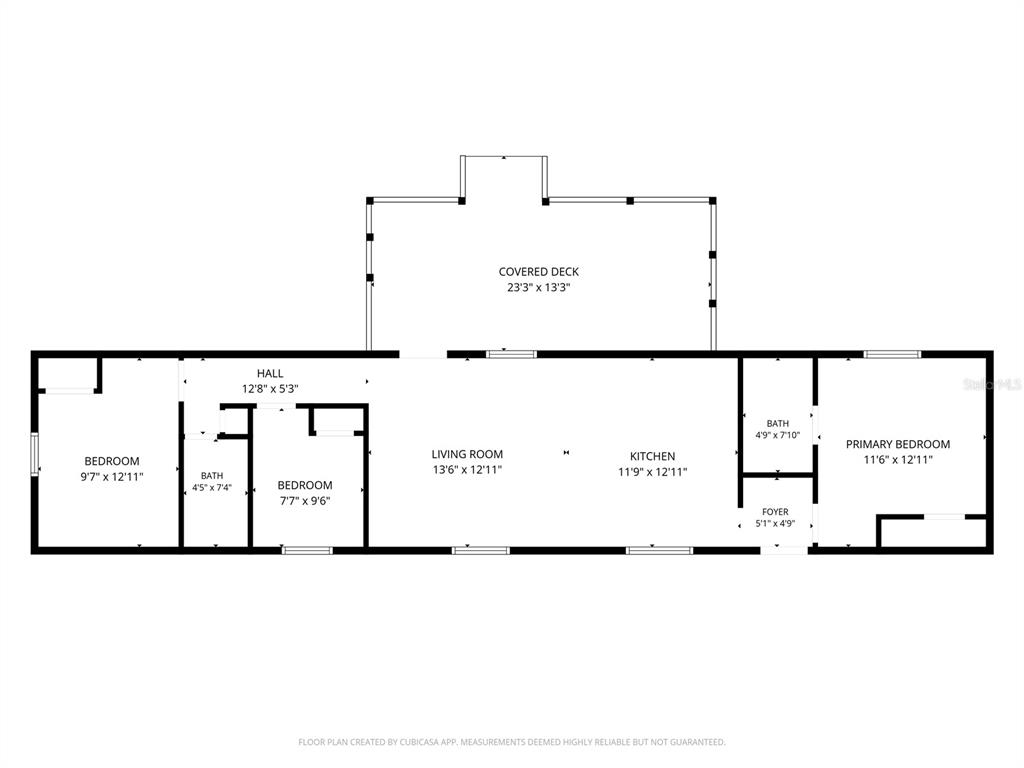 This is a floor plan showing a home with three bedrooms, two baths, and a deck — 706 DAVID AVENUE, INTERLACHEN, FL