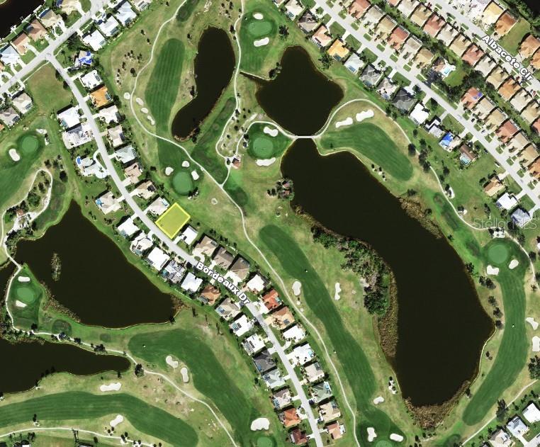 This is an aerial map view of a vacant residential lot on a golf course — 3800 BORDEAUX DRIVE, PUNTA GORDA, FL
