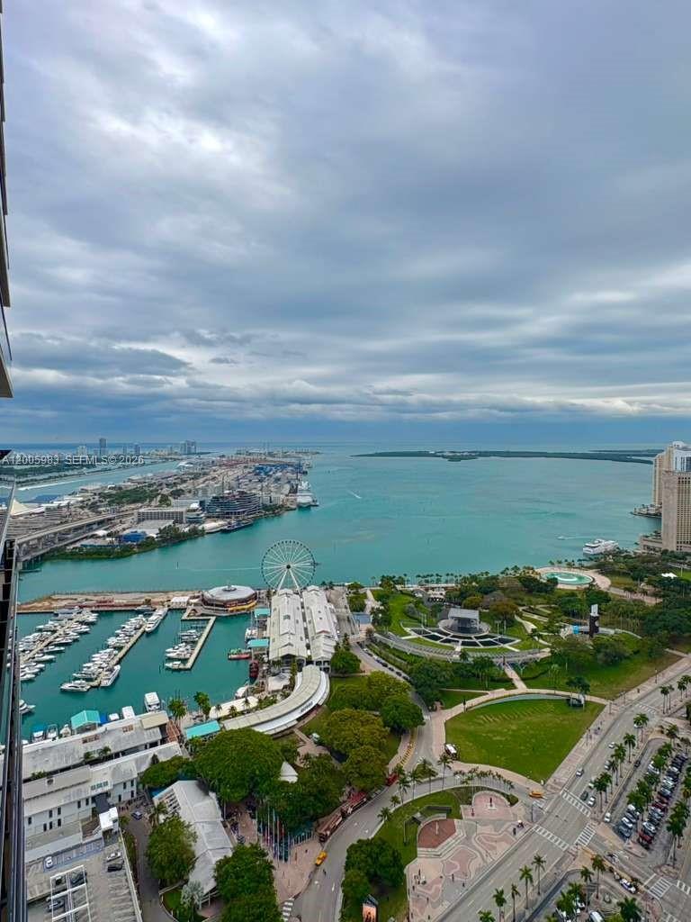 An aerial view of a waterfront park, marina, and Ferris wheel in Miami — 398 NE 5th St # 4313, Miami FL 33132, MIAMI, FL
