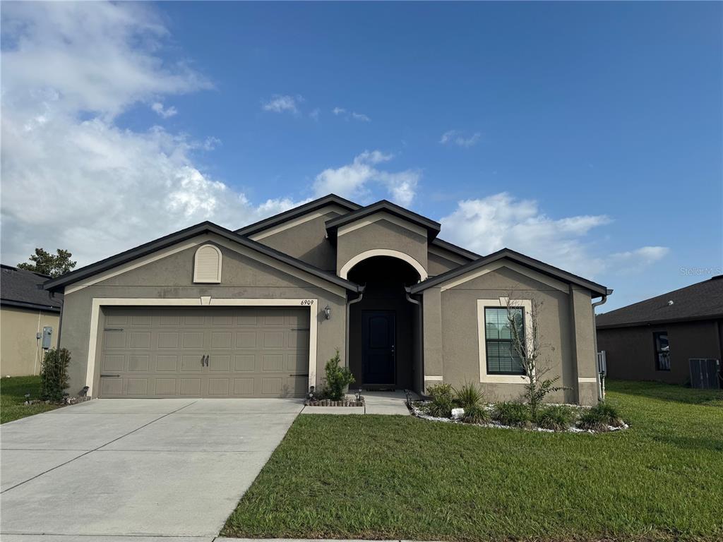 6909 CRESTED ORCHID DRIVE