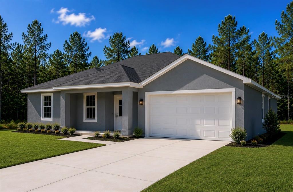 A single-story gray house with a white garage door and a concrete driveway — 16440 MEDLEY ROAD, WEEKI WACHEE, FL