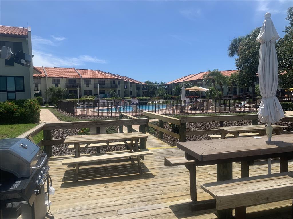 A wide view of a calm bay with small islands and a distant bridge — 1515 PINELLAS BAYWAY S UNIT 34, ST PETERSBURG, FL