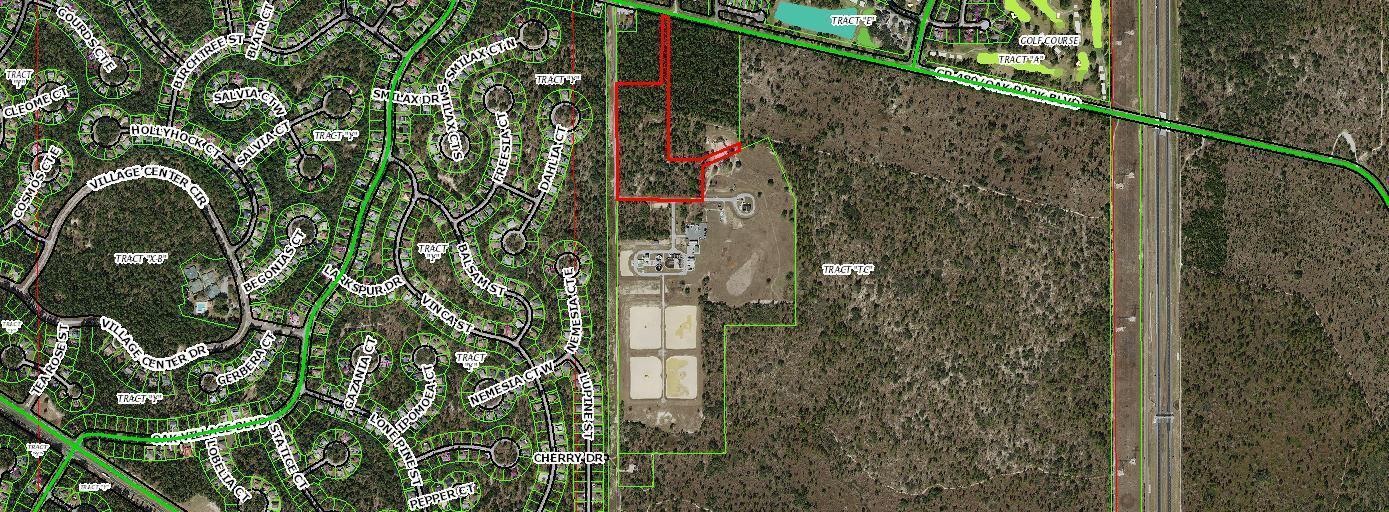 This aerial map shows a parcel of land outlined in red and green near residential streets — 4904 W Oak Park Boulevard, FL 34446, FL