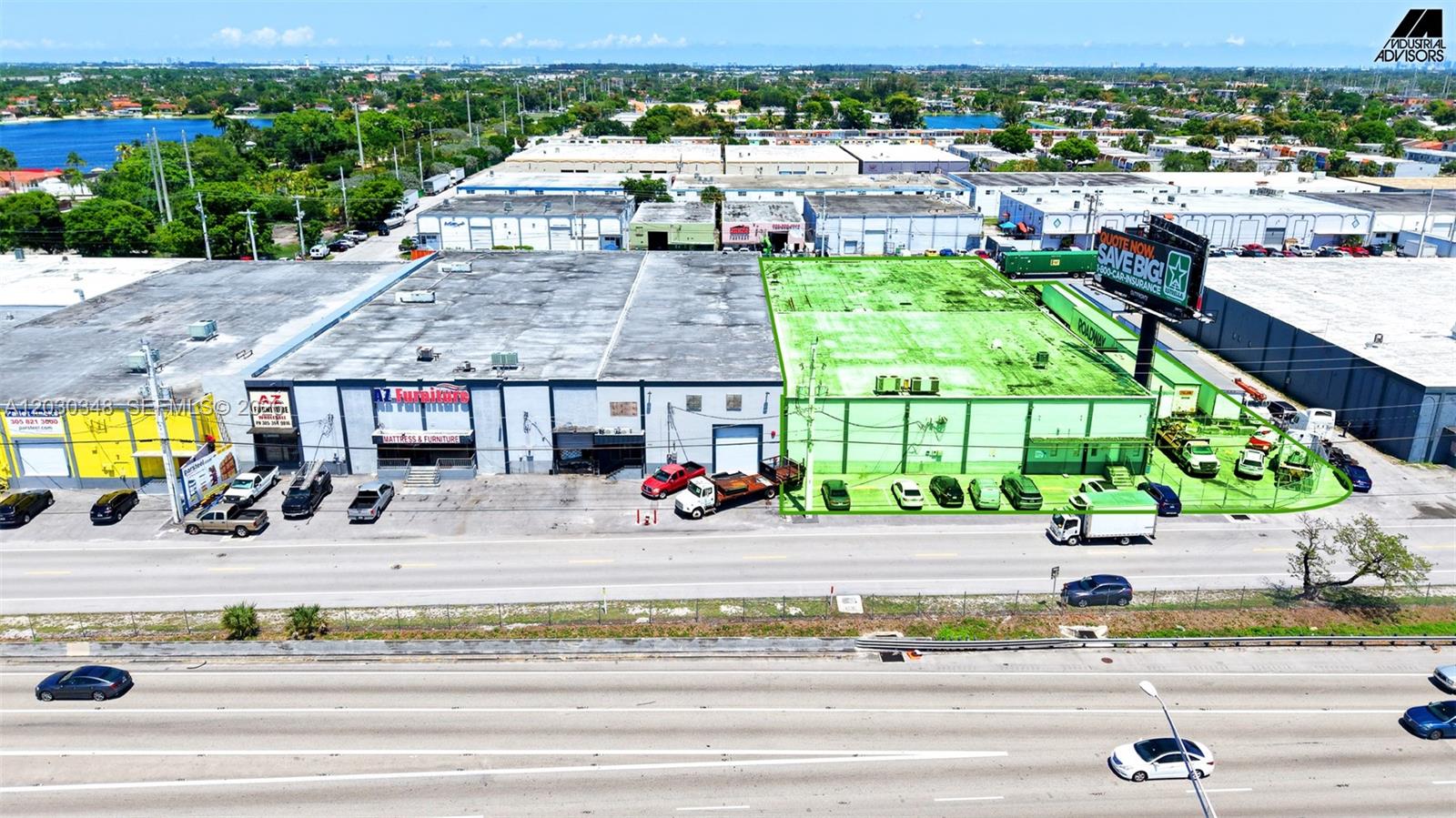 An aerial view shows a commercial warehouse building with a highlighted green section and parking — 7435 W 20th Ave, Hialeah FL 33014, HIALEAH, FL