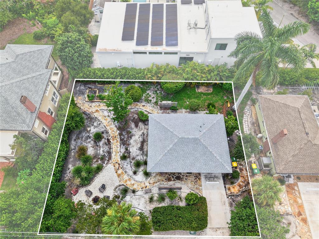 An aerial view of a house with a stone path and landscaped yard — 2475 ALAMEDA AVENUE UNIT B, SARASOTA, FL
