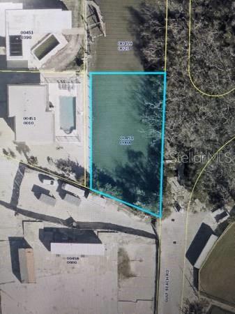 An aerial map shows a vacant rectangular lot outlined in blue next to a waterway — TROPICAL SHORE WAY, FORT MYERS BEACH, FL