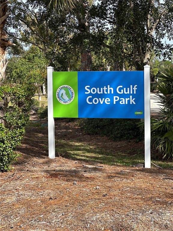 A sign for South Gulf Cove Park stands in a wooded area — 10138 LONG BRANCH STREET, PORT CHARLOTTE, FL