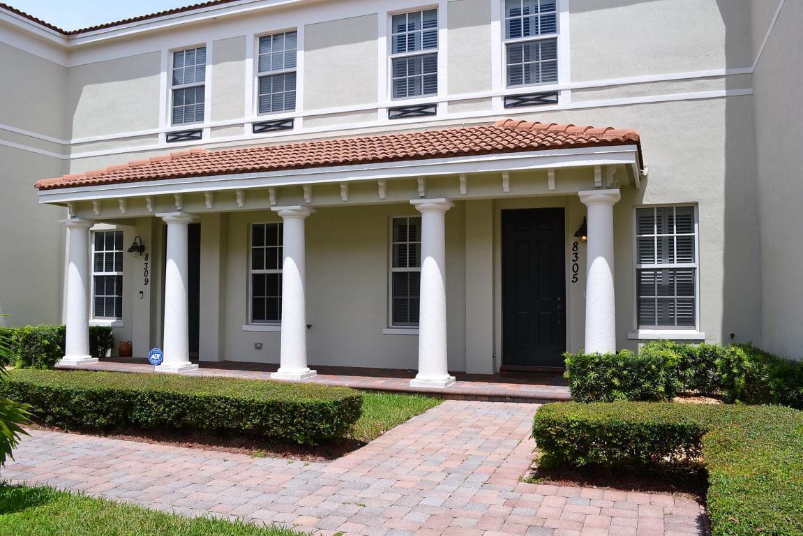 A two-story building exterior features a covered porch with white columns and a tiled roof — 8305 NW 7th Court, Boca Raton FL 33487, BOCA RATON, FL
