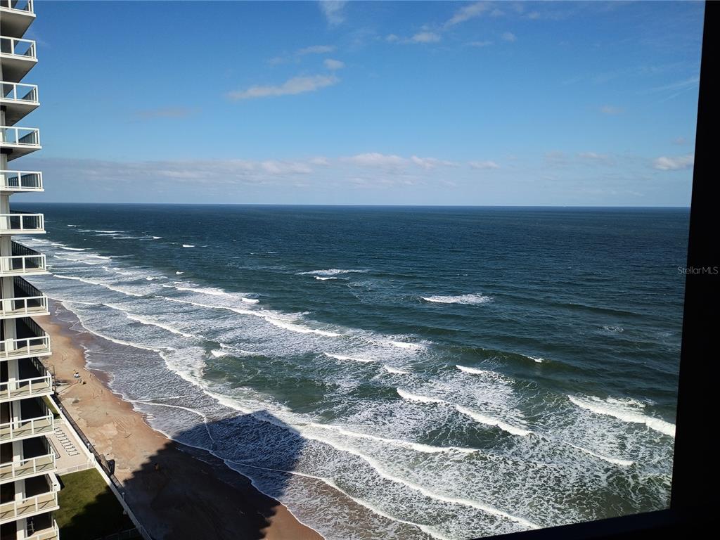 An elevated view of the ocean and beach from a high-rise balcony — 2900 N ATLANTIC AVENUE UNIT 2001, DAYTONA BEACH, FL