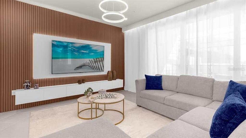 A living room features a slatted wood accent wall, a wall-mounted television, and a sectional sofa — 1236 BLUE ISLAND DRIVE, CLERMONT, FL
