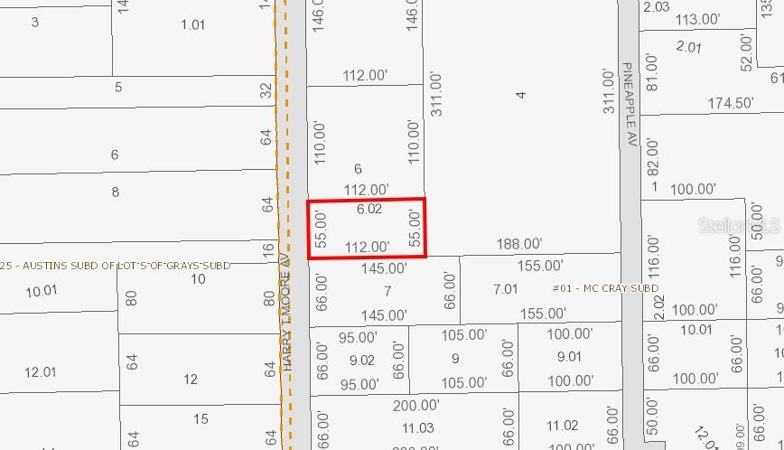 This is a property tax map showing lot dimensions and parcel boundaries — 2735 HARRY T MOORE AVENUE, MIMS, FL