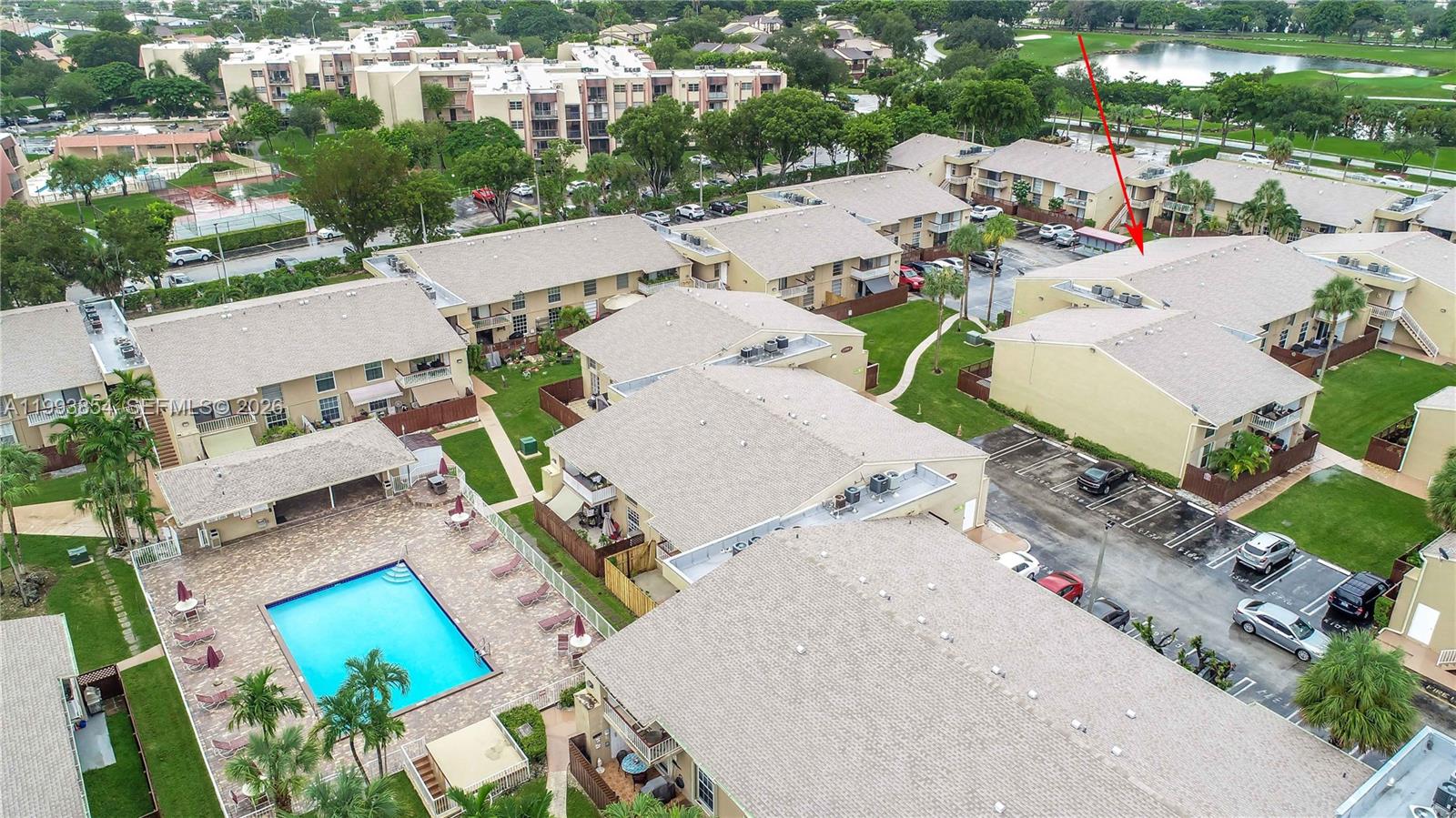 An aerial view shows multiple apartment buildings, a swimming pool, and a parking lot — 13785 SW 66th St # 239C, Miami FL 33183, MIAMI, FL