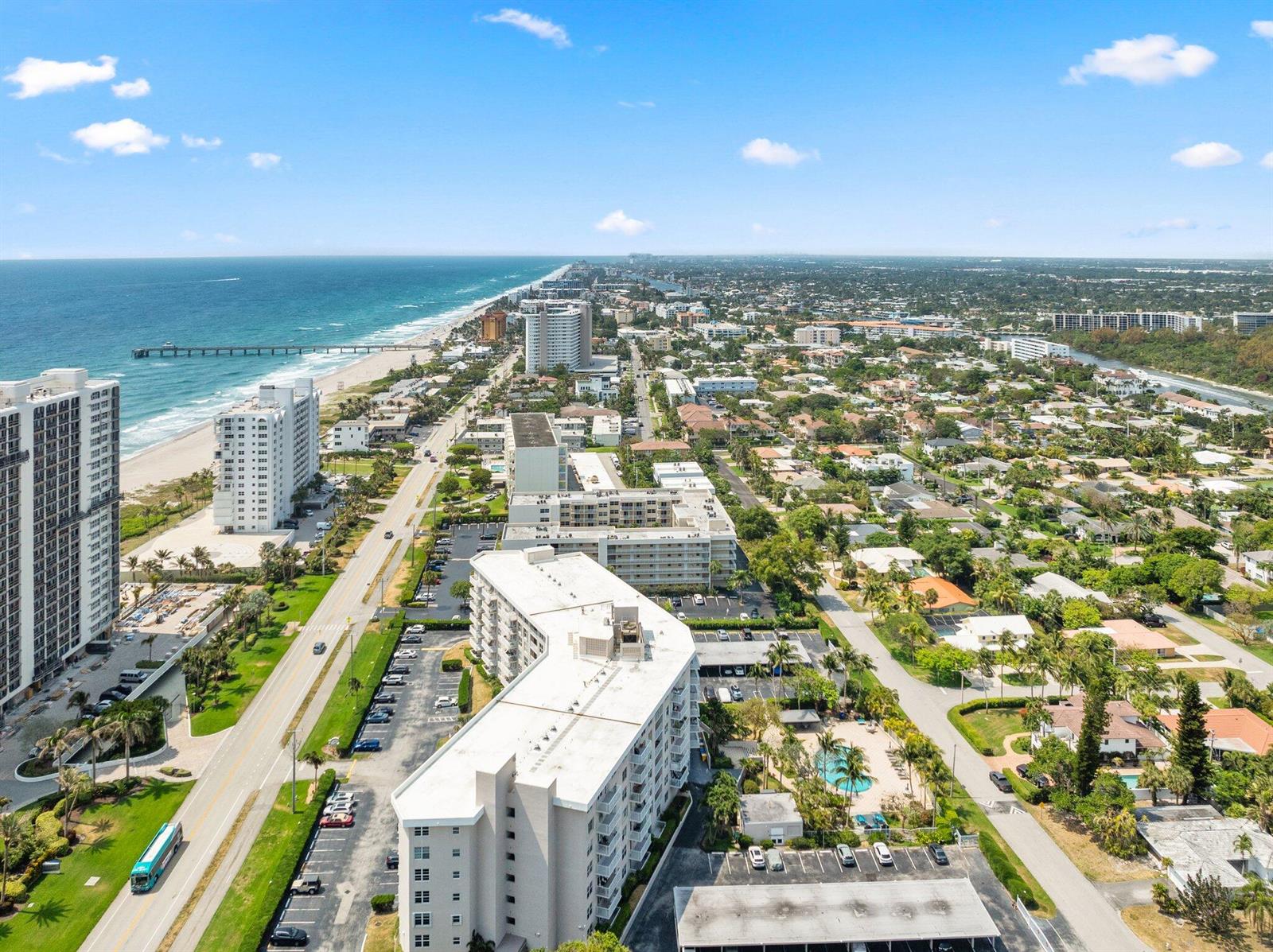 An aerial view shows a coastal city with high-rise apartment buildings, a beach, and ocean — 2851 S Ocean Boulevard # 6, Boca Raton FL 33432, BOCA RATON, FL