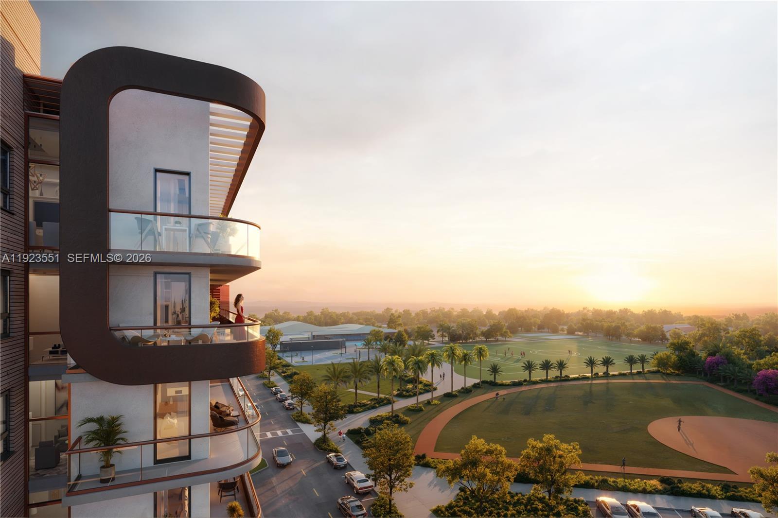 This architectural rendering shows a modern apartment building balcony overlooking a park with sports fields — 218 SE 7th St # 411, Hallandale Beach FL 33009, HALLANDALE BEACH, FL