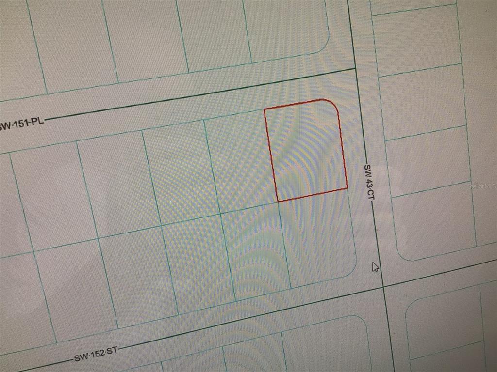 This is a digital map showing a highlighted parcel of land near a street intersection — 0 SW 151 PLACE, OCALA, FL