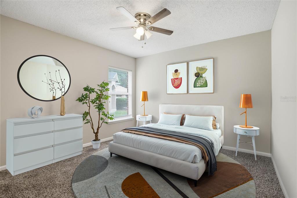 A dining room features a wooden table, six chairs, a sideboard, and a large arched window — 5736 GUANA PARK COURT, JACKSONVILLE, FL