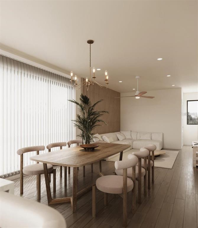 This rendering shows a dining area with a wooden table and chairs near a living room — 2168 9TH AVENUE N, ST PETERSBURG, FL