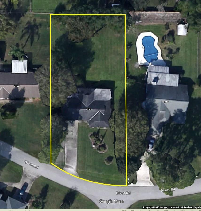 This satellite map view shows a residential property with a house and a large backyard — 3401 Divot Road, Sebring FL 33872, SEBRING, FL
