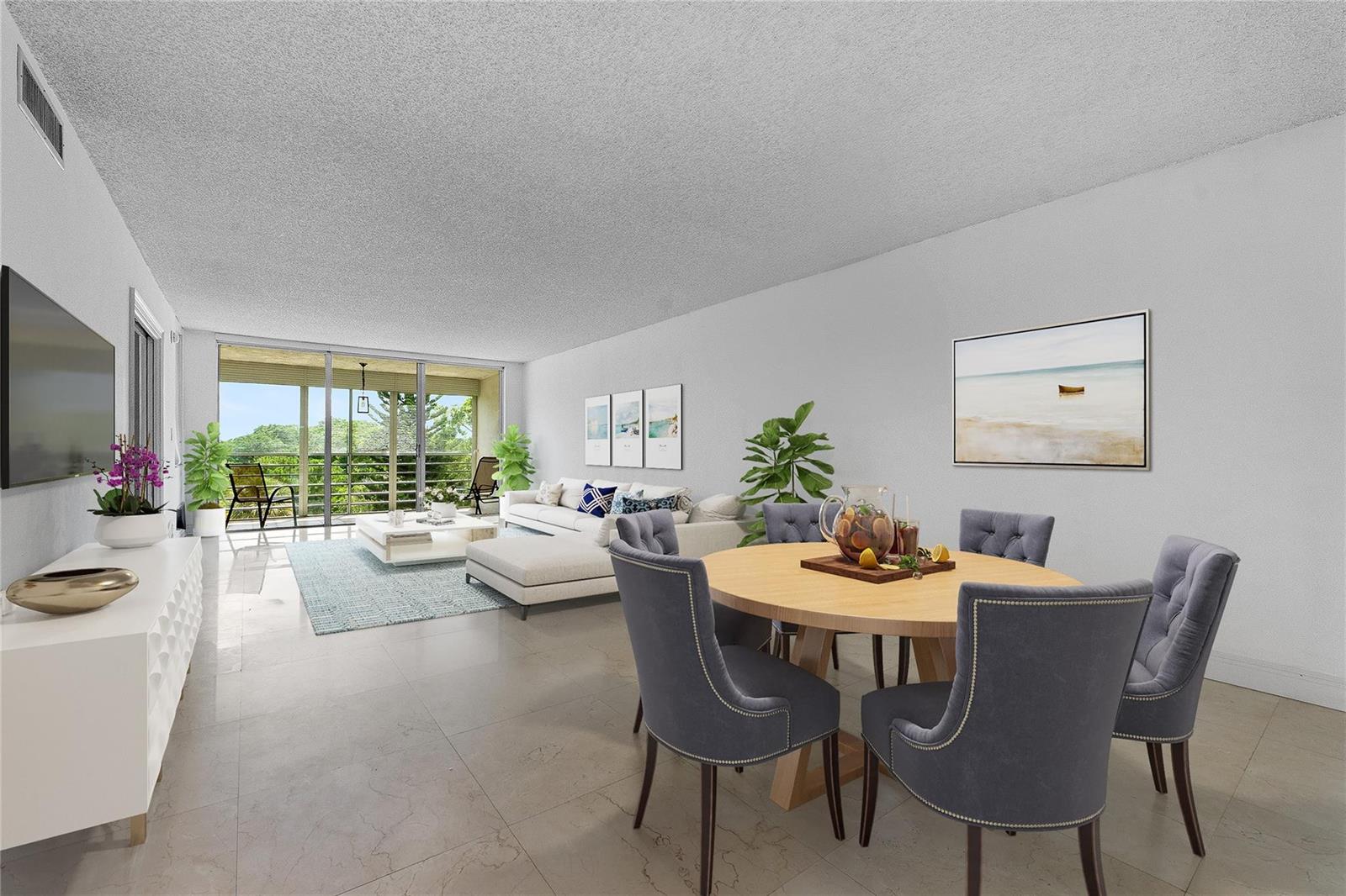 A living and dining room with tile floors, a sectional sofa, and a balcony view — 535 Oaks Drive # 508, Pompano Beach FL 33069, POMPANO BEACH, FL