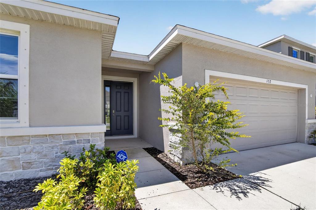 This is a floor plan for a four-bedroom house with an optional den configuration — 152 BRIGHT IBIS AVENUE, APOLLO BEACH, FL
