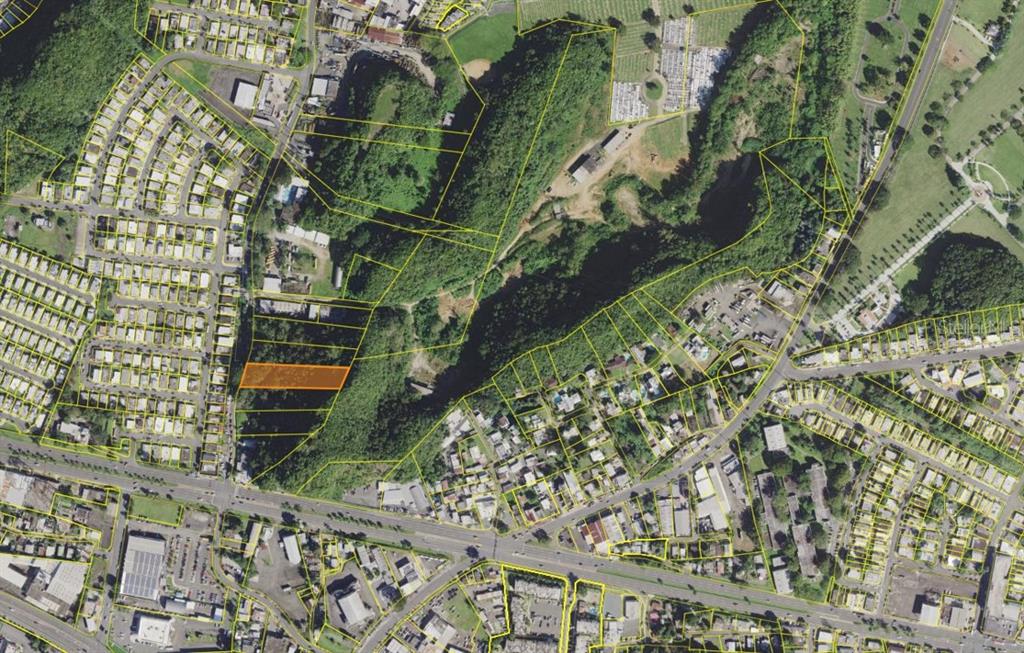 An aerial map view shows a highlighted rectangular land parcel surrounded by residential and wooded areas — HATO TEJAS ST RD 872 KM 0.2 LOT D, BAYAMON, PR