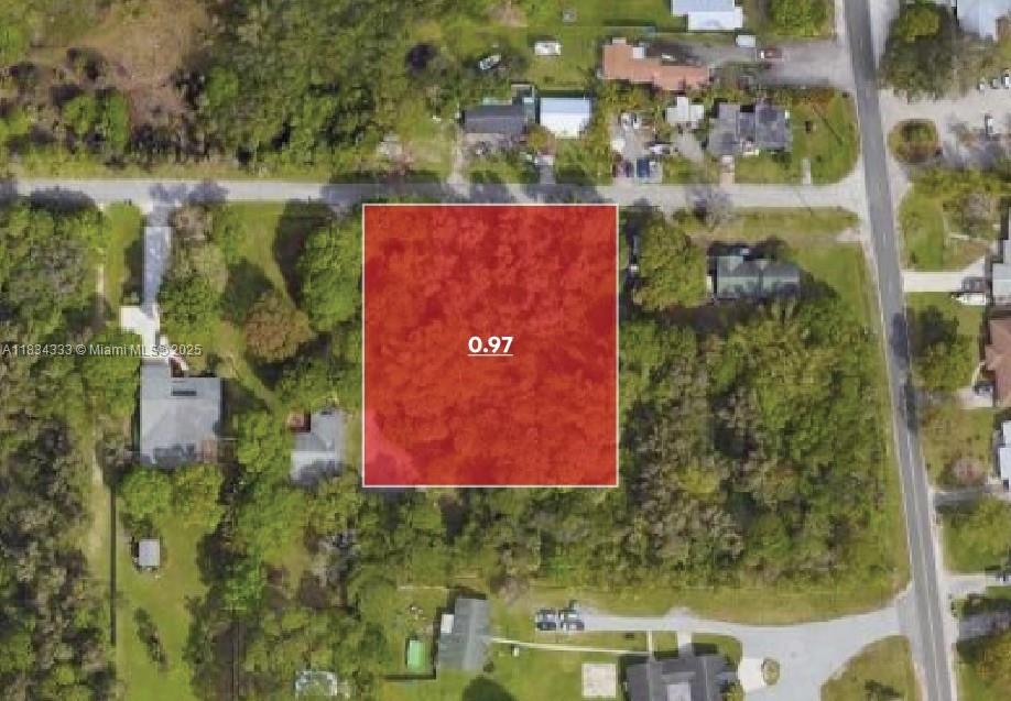 This is an aerial map view of a rectangular, wooded plot of land — 1991 Dade Rd, Fort Pierce FL 34982, FORT PIERCE, FL