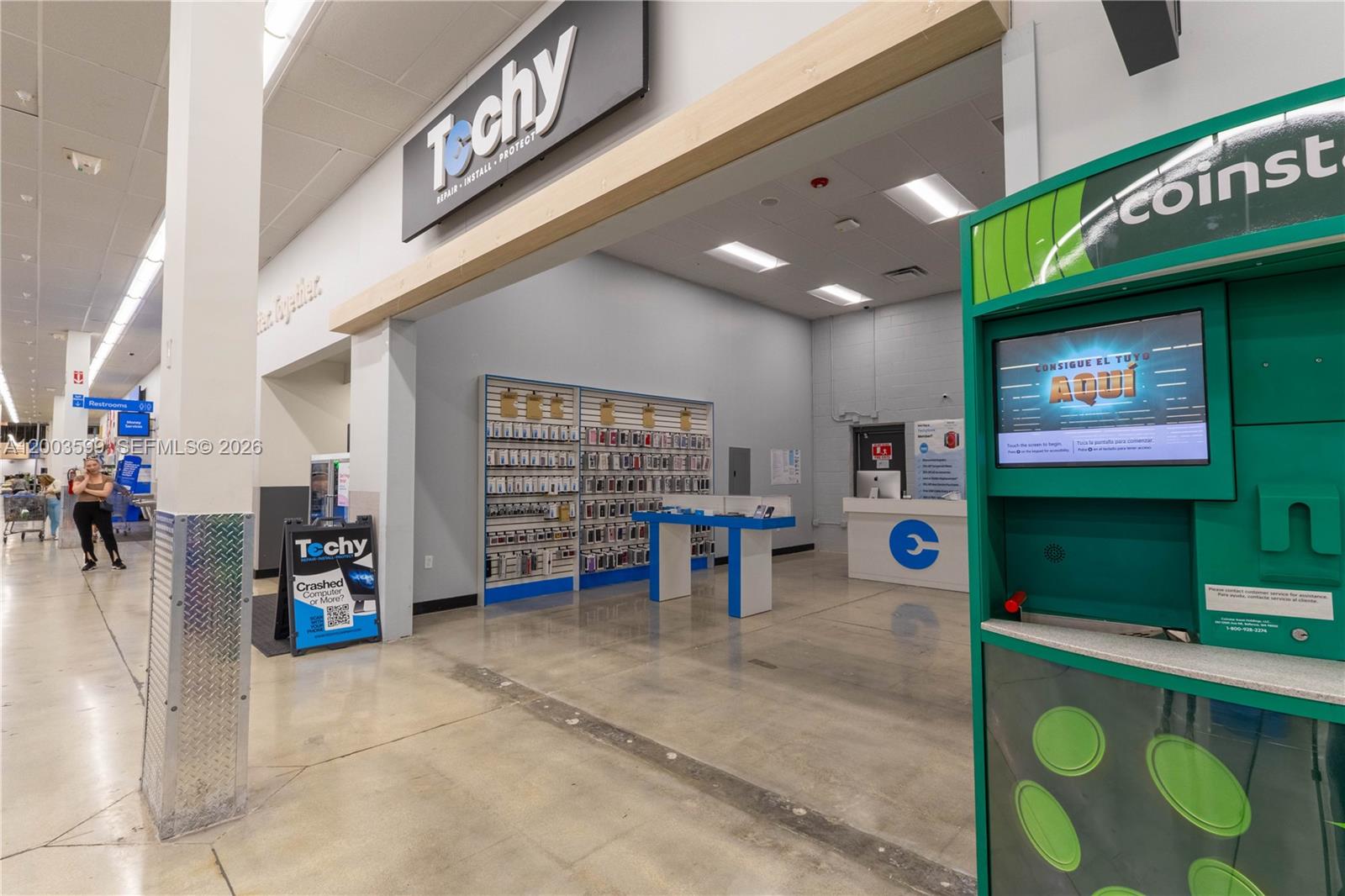 A Techy repair store and a Coinstar kiosk are located inside a retail building — 1800 S University Dr, Miramar FL 33025, MIRAMAR, FL