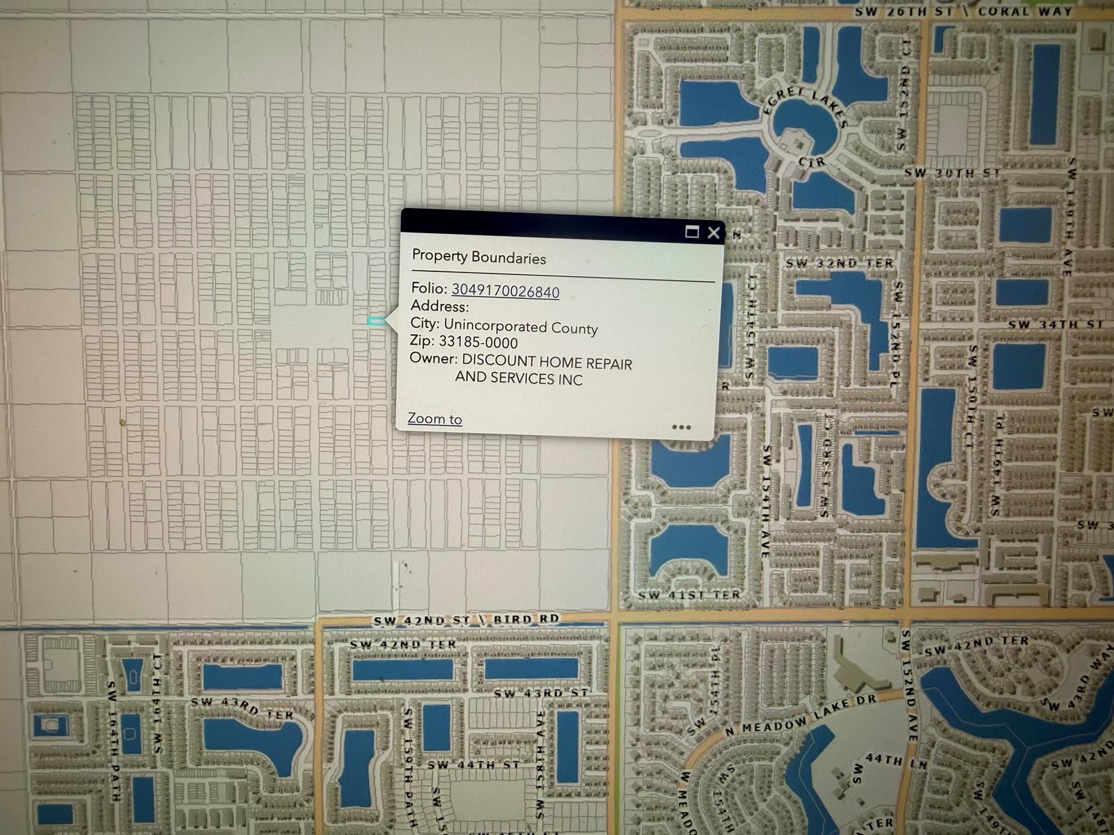 This is a digital map showing property boundaries and ownership information for a specific parcel — 34 Street SW 160th Avenue, FL 33185, FL
