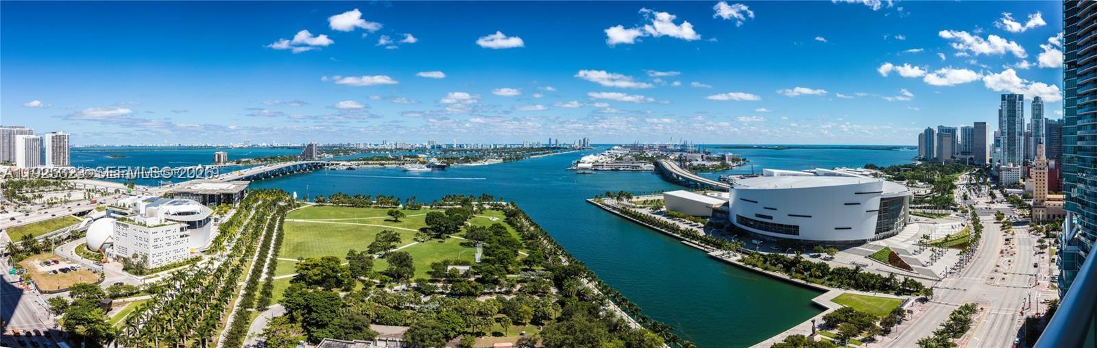 A panoramic view of a waterfront park, the Kaseya Center, and the Miami skyline — 900 Biscayne Blvd # 2604, Miami FL 33132, MIAMI, FL