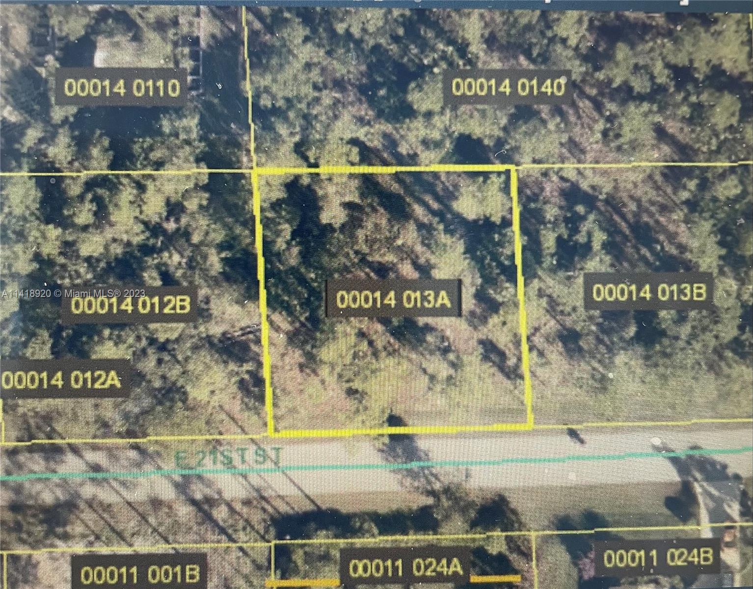 This is an aerial map showing a rectangular land parcel labeled 00014 013A — 3305 E 21st ST, Lehigh Acres FL 33920, LEHIGH ACRES, FL