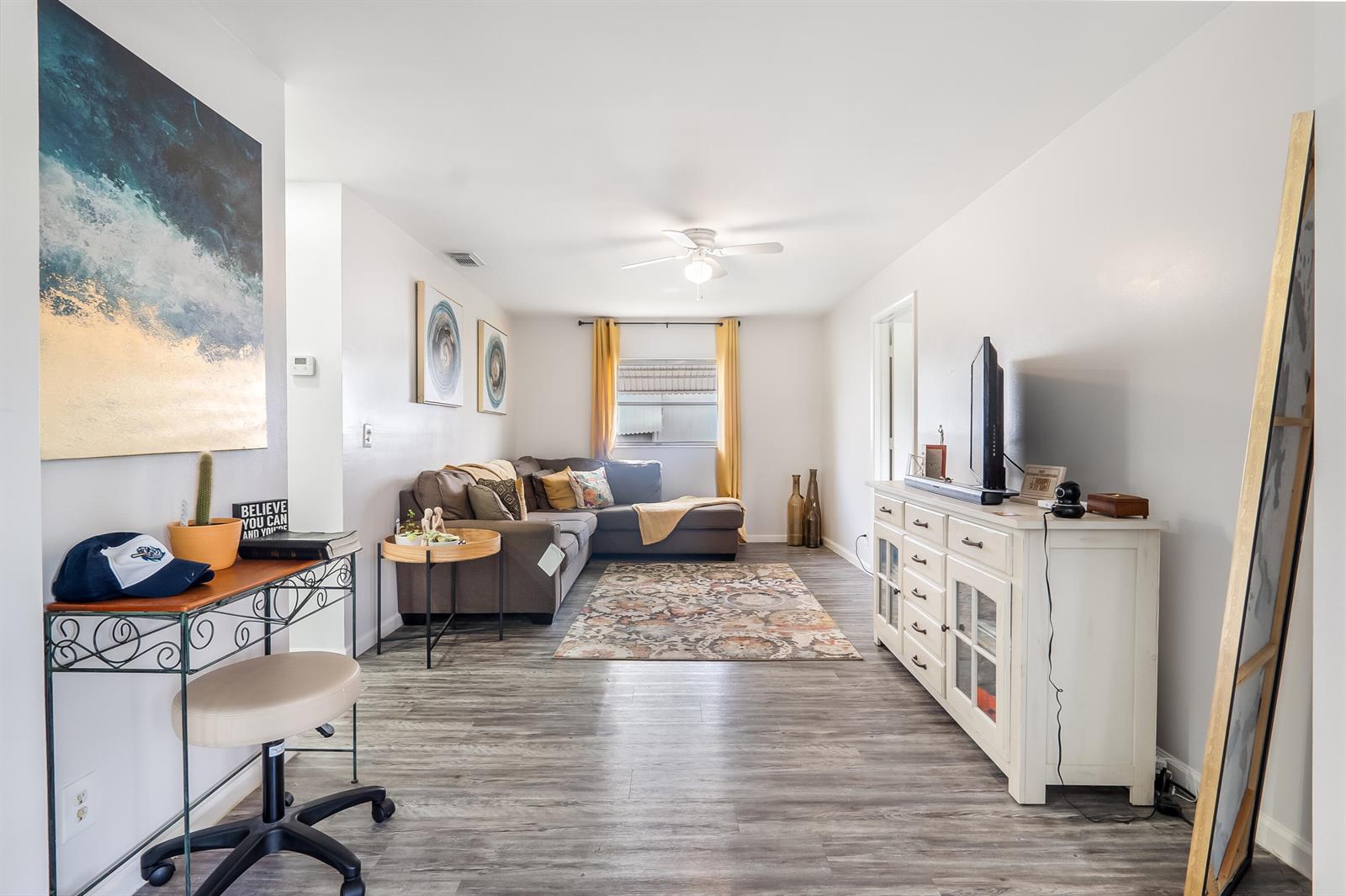 A kitchen with white cabinets, stainless steel appliances, quartz countertops, and a subway tile backsplash — 1501 SW 18th Drive, Boynton Beach FL 33426, BOYNTON BEACH, FL