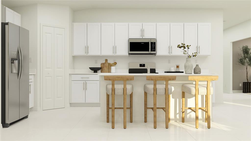 This is a digital rendering of a modern kitchen with white cabinets and a breakfast island — 5988 YELLOW HORNBILL AVENUE, WIMAUMA, FL