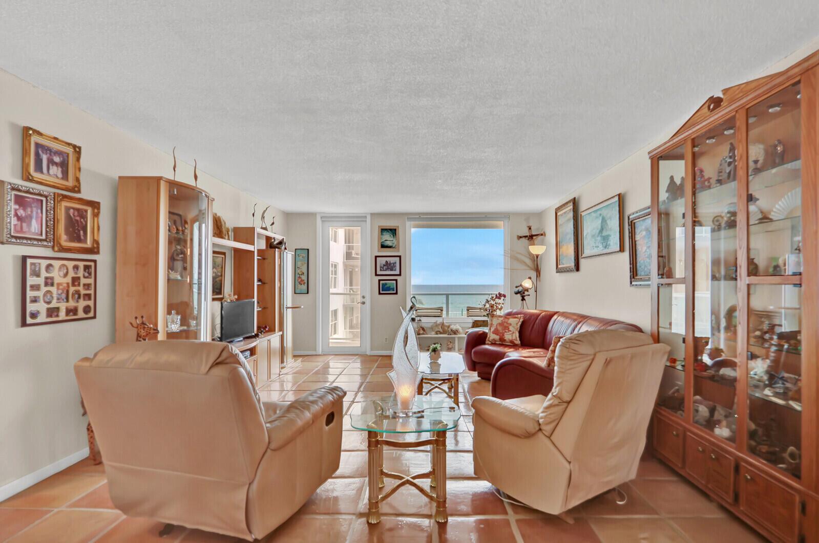 An aerial view of a multi-story apartment building with a pool deck and beach access — 3450 S Ocean Boulevard # 316, Palm Beach FL 33480, PALM BEACH, FL