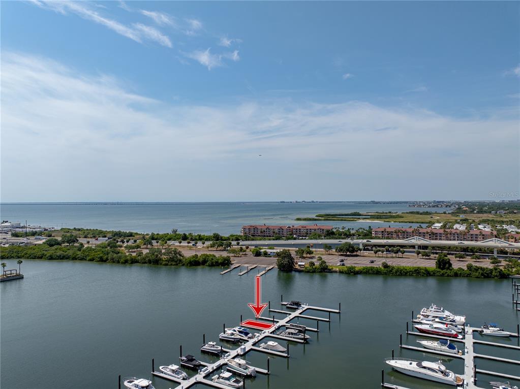 An aerial view shows a boat slip highlighted in red at a marina — 5120 MARINA WAY UNIT D-W-15, TAMPA, FL