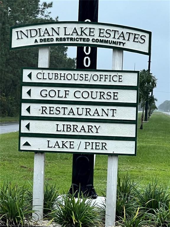 A sign for Indian Lake Estates lists directions to various community amenities — 0 GAILLARDIA DRIVE, INDIAN LAKE ESTATES, FL