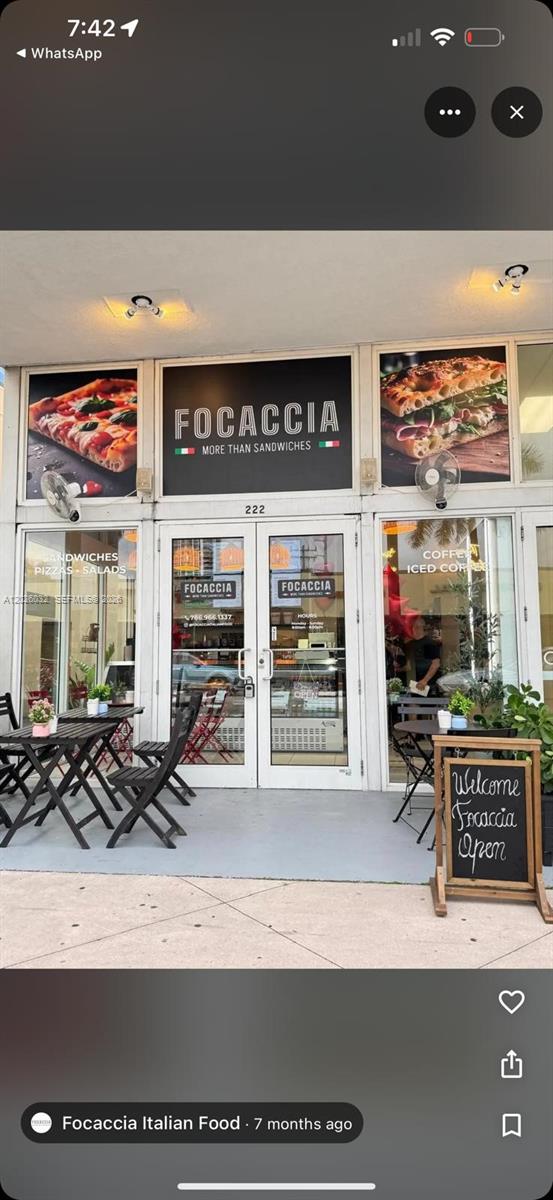 The exterior of a restaurant storefront features a sign reading Focaccia above glass doors — NORTH MIAMI BEACH, FL