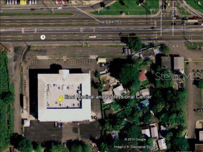 This is an aerial map view of a commercial building and its surrounding parking lot — 3 PR-3 KM 19.9, BARRIO DOS CUERDAS, CANOVANAS, PR